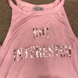 ‘Not interested’ pink tank top